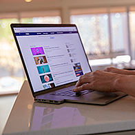 A person is searching on a laptop for information on the morning-after pill.