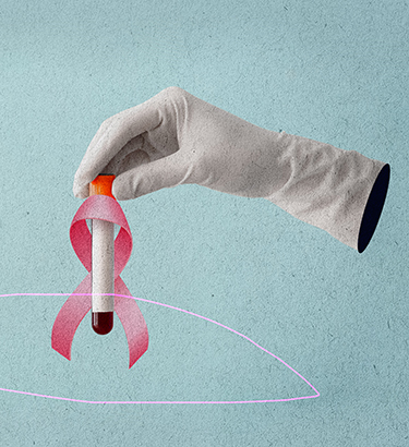 A white-gloved hand holds a vial of blood with a pink breast cancer awareness ribbon around it.