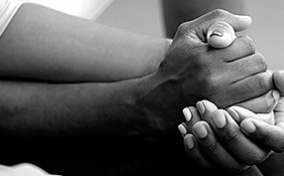 thumbA couple hold hands while they attend sex therapy.